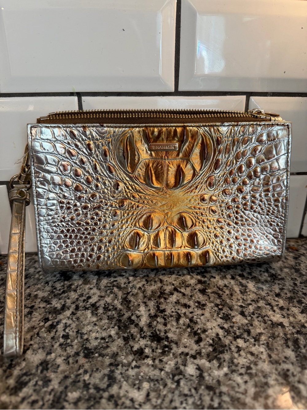 Brahmin wristlet. Gold/ champagne